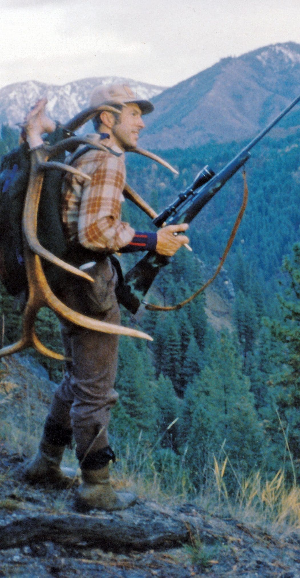 George with a successful elk strapped to his back.