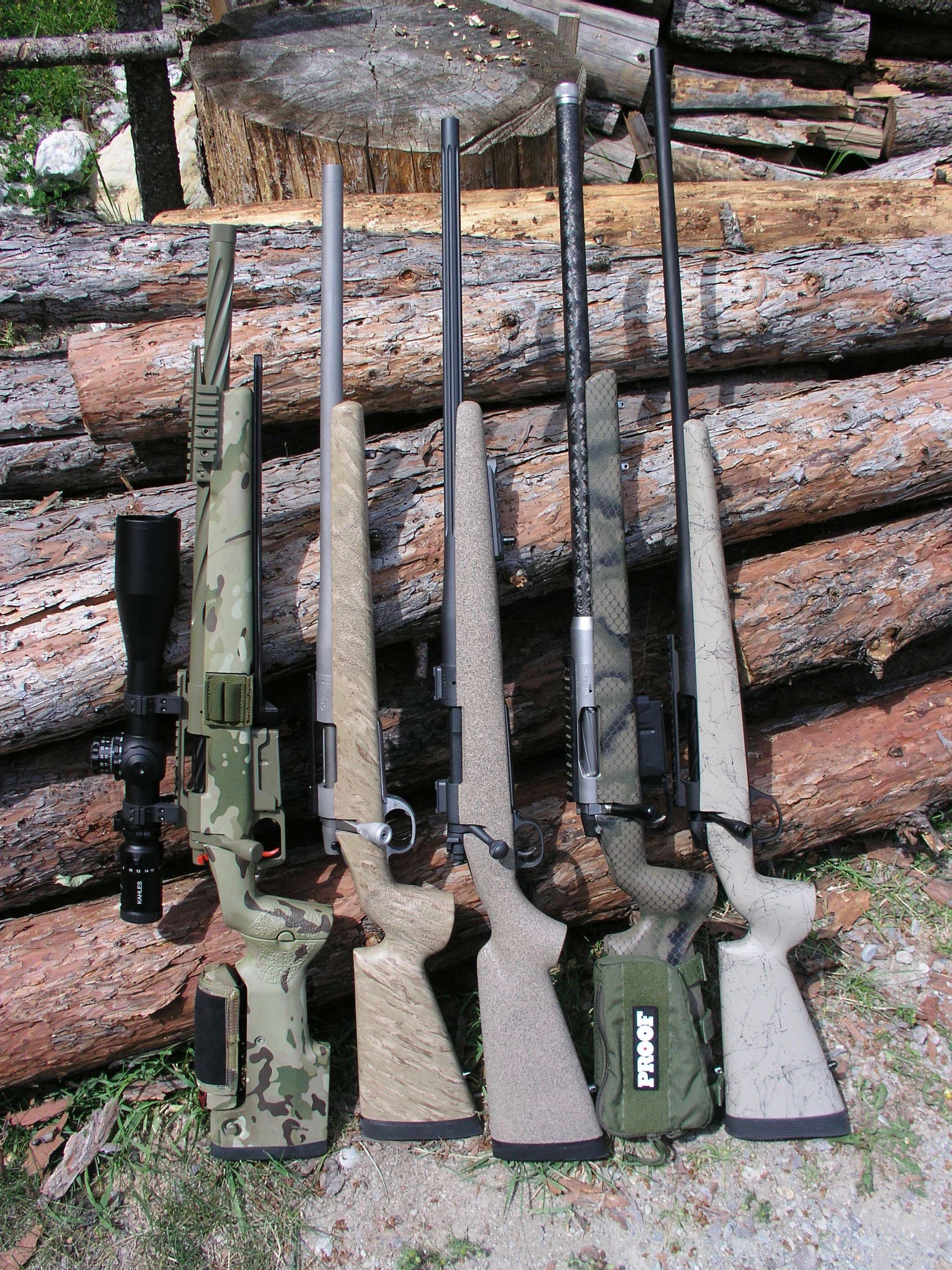 Five rifles showing different barrel lengths